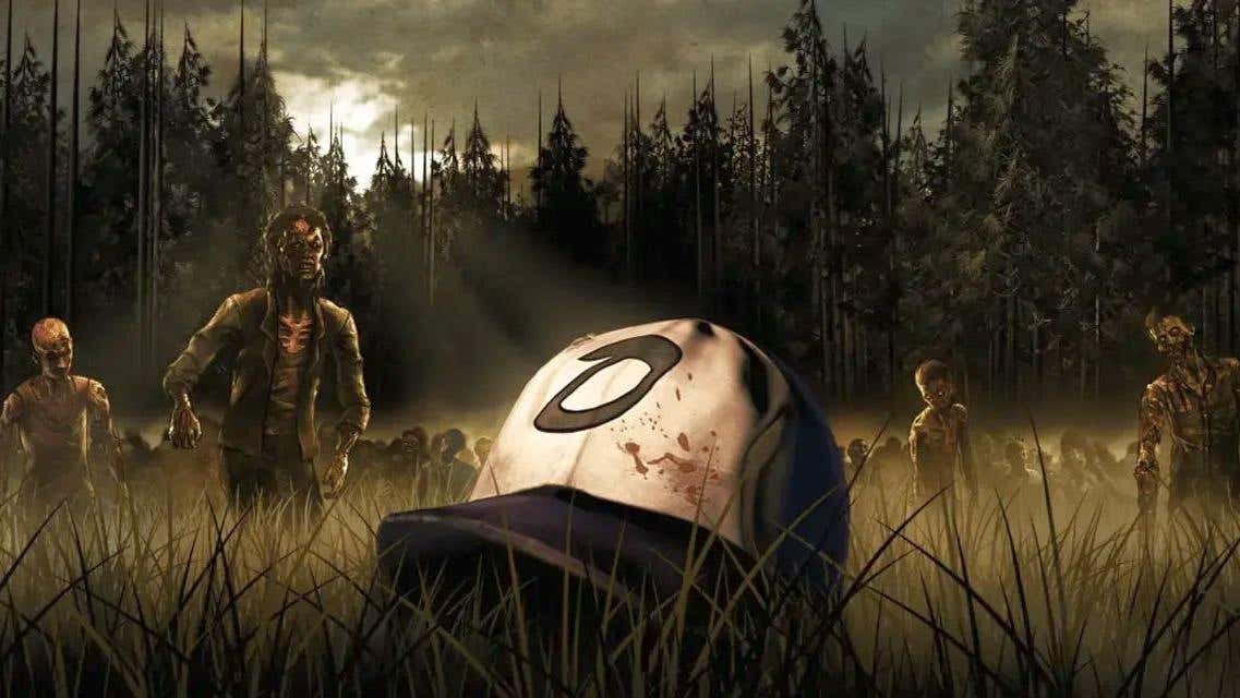 A bloody baseball cap lies in a field full of zombies